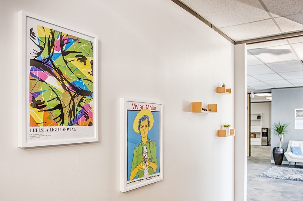Art, plants, and decoration on the walls of the Workhorse office