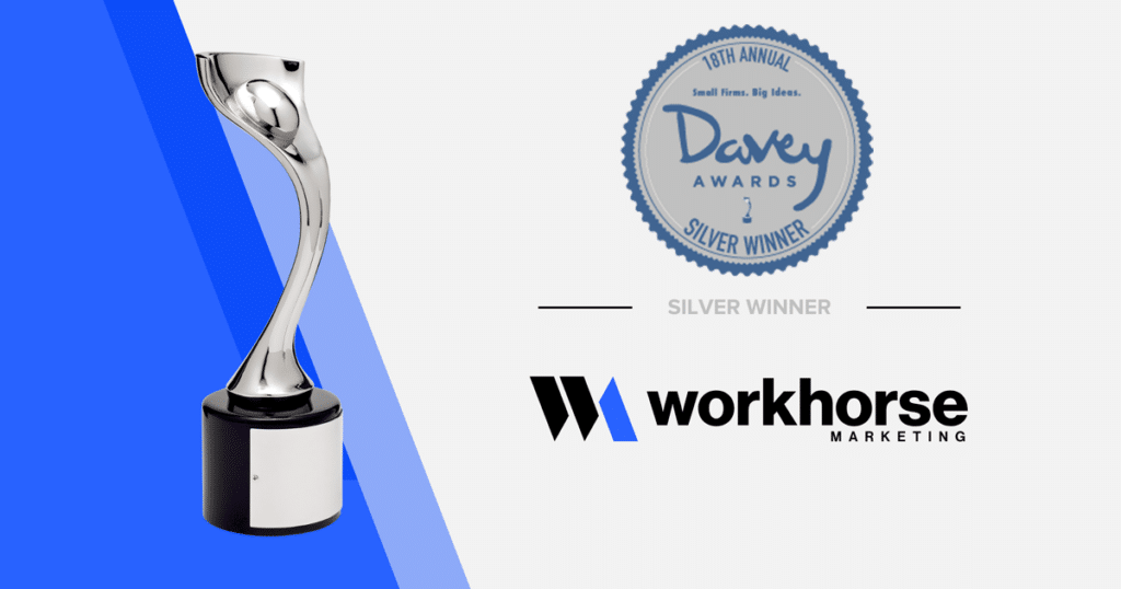 The Workhorse Marketing logo displayed next to a 2023 silver Davey Award trophy.